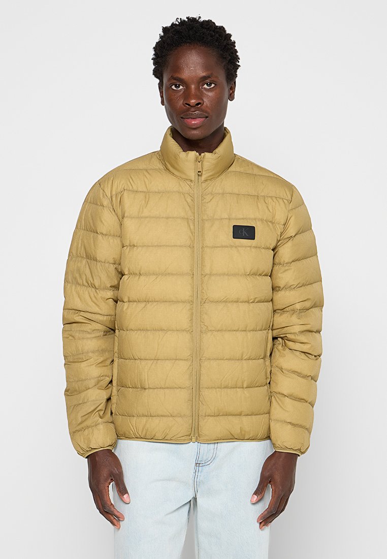 Calvin Klein Jeans Gewatteerde jas mosterdgeel Calvin Klein Jeans Gewatteerde jas mosterdgeel