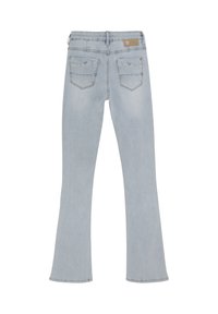 Blå denim flarejeans med en ljus tvätt, två bakfickor och subtila söm detaljer. Raka från midjan till knäna, vidgar sig vid fållen.