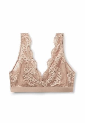 Lace bralette in beige with scalloped edges and a deep V-neck design. Features floral lace overlay and a soft, elastic band.