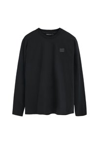 Czarna koszula z długim rękawem wykonana z bawełny, z okrągłym dekoltem i teksturowanym, kwadratowym logo na lewej piersi. Klasyczny krój.
