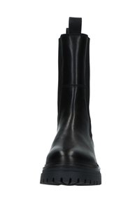 Stivaletti neri con tomaia in pelle liscia, pannelli laterali elasticizzati e suola in gomma testurizzata. Presentano un tassello per facilitare l'indossamento.