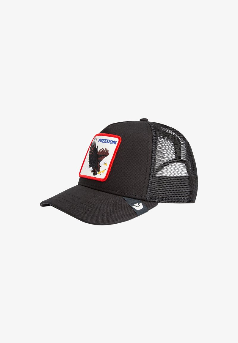 Schwarze Trucker-Kappe mit einem Vorderpatch, das einen Adler und den Text "FREIHEIT" zeigt. Netzrücken und gebogener Schirm. Der Stoff ist glatt mit strukturiertem Design.