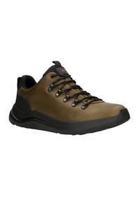 Scarpe da trekking in pelle marrone con dettagli neri. Presentano lacci spessi, occhielli rotondi e una suola in gomma texturizzata per una migliore aderenza.