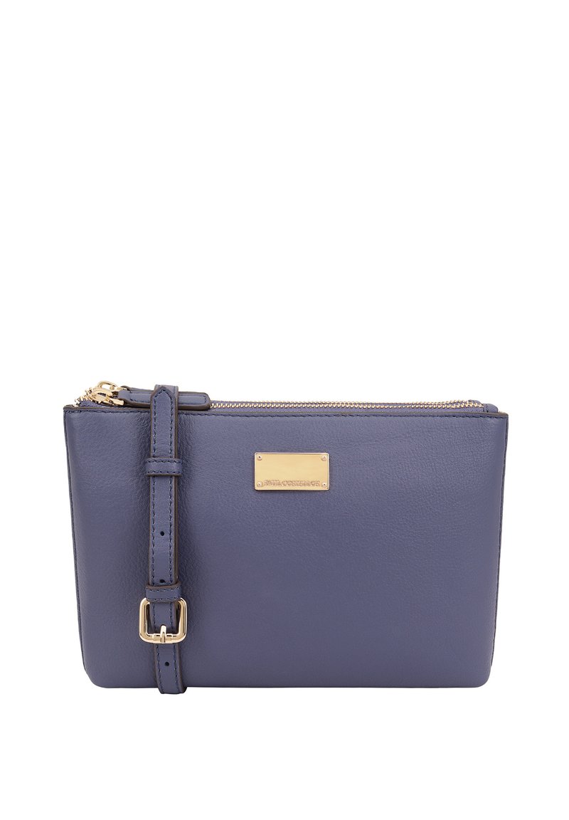 Navyblauwe leren schoudertas met ritssluiting, verstelbare schouderband en gouden hardware-accenten. Glad oppervlak, minimalistisch ontwerp.