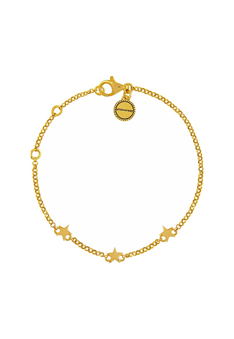 Pulsera chapada en oro con un diseño de cadena delicada y colgantes en forma de estrella, con un cierre de langosta. Incluye un charm con el logo.