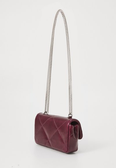 Burgundy leather handbag with a quilted design, rectangular shape, and silver chain strap. Features a flap closure and smooth texture.