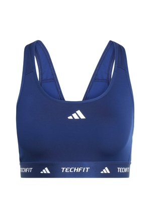 Tumši zils sporta krūšturis no gludas auduma ar zemu izgrieztu kakla līniju, platām lencēm un baltu logotipu un joslu ar uzrakstu "TECHFIT".