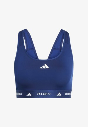 Marineblauer Sport-BH aus glattem Stoff, mit tiefem Rundhalsausschnitt, breiten Trägern und einem weißen Logo sowie einem Band mit dem Schriftzug "TECHFIT".