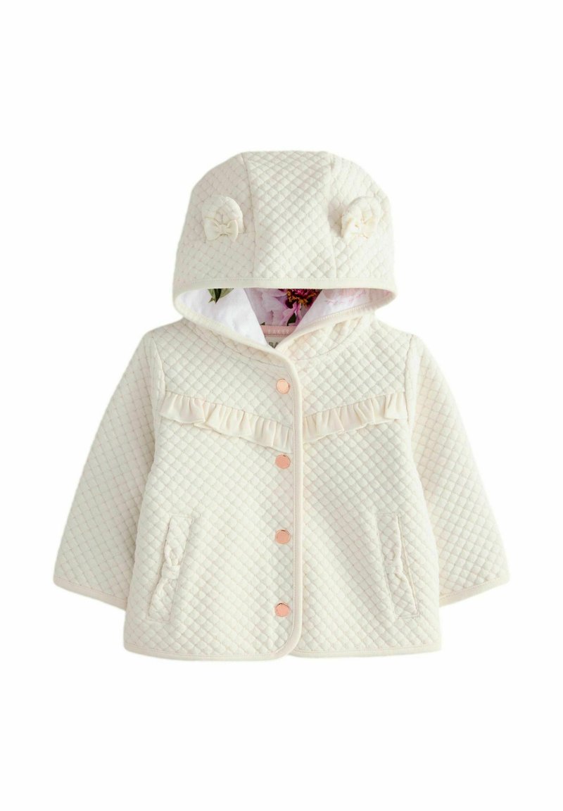 Padded krémová prešívaná bunda s kapucňou, ktorá má uši medveďa, volánový detail, patentky a bočné vrecká. Textúrovaná tkanina s kvetinovou podšívkou.