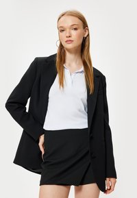 Koton SLIM FIT - Shorts - black