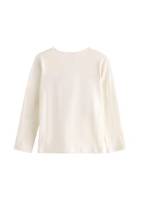 Langærmet top i blødt, cremefarvet stof. Har en rund halsudskæring og et sømløst bagdesign med en glat tekstur.