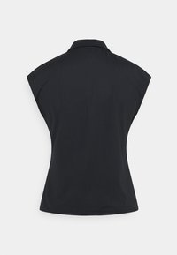 Svart ärmlös polo-shirt i slät tyg med en avslappnad passform, med en klassisk krage och utan synliga mönster eller detaljer.