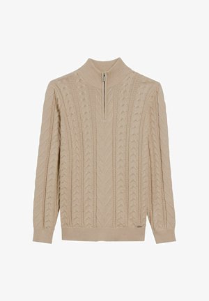 Beżowy sweter wykonany na drutach z wysokim kołnierzem i ćwierć zamkiem. Posiada teksturowane wzory w warkocze oraz ściągacze przy mankietach i u dołu.