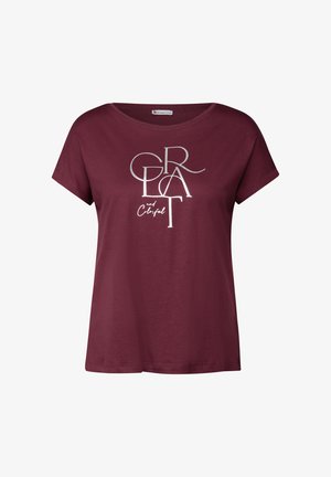 T-shirt bordeaux en coton doux, avec un design graphique argenté portant l'inscription "GRAP and Colorful". Coupe décontractée avec des manches courtes.