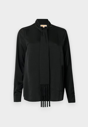 Black long-sleeve blouse in smooth fabric with a tied scarf collar and fringe detail at the bottom of the scarf, featuring a loose fit.