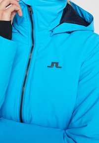 J.LINDEBERG Sports Dunjacka - turquoise