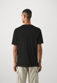 Diesel ADJUST - Print T-shirt - black