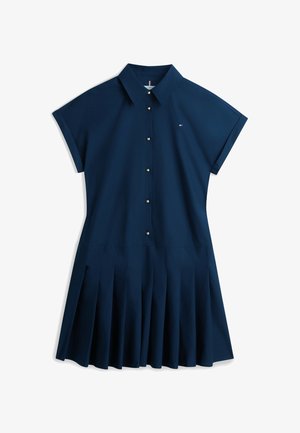 Haljina košulja tamnoplave boje s kratkim rukavima, zlatnim gumbima, klasičnim ovratnikom, plisiranom suknjom i malim logom na prsima.