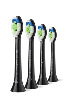 Vier Philips Sonicare tandenborstelkoppen in het zwart. Elke kop heeft witte haren, blauwe en groene accenten, en een taps toelopend ontwerp.