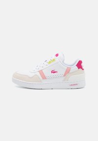 White sneakers with pink and yellow accents, leather and suede materials, rounded design, perforated detail on the sides, featuring a Lacoste logo.