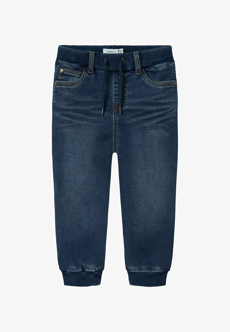 Tumši zili džinsa joggeri ar mīkstu elastīgu jostu, aprocēm un piecu kabatu dizainu, ar kontrastējošiem sašuvumiem un auklas detaļu.