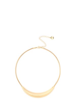 Gold-tone necklace featuring a smooth crescent pendant on a slim, textured chain. Adjustable clasp with a chain extension for fit enhancement.