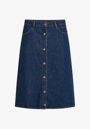 Spódnica dżinsowa w ciemnym niebieskim kolorze o prostej sylwetce. Posiada zapięcie na przodzie na metalowe guziki oraz boczne kieszenie. Klasyczne przeszycia.