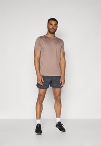 New Balance REFLECTIVE SHORT  - Pantalón corto de deporte - black
