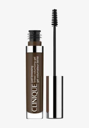 Gel volumisant teinté brun avec un corps transparent et un capuchon argenté. Comprend un applicateur en brosse courbée pour une application précise.