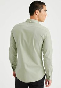 DOCKERS STRETCH OXFORD - Camicia - lint dyed light green