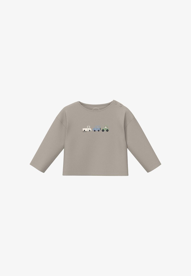 Chemise beige à manches longues pour tout-petit avec trois petites illustrations de véhicules (camion, voiture, tracteur) sur la poitrine et des boutons-pression à l'épaule.