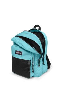 Zaino turchese con una tasca frontale in rete nera, due scomparti con cerniera e spallacci regolabili. Dotato di toppa con il logo Eastpak.