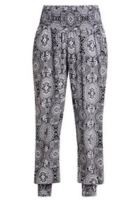 Black and white patterned pants with an elastic waistband, gathered at the ankles, featuring a textured fabric with intricate designs.