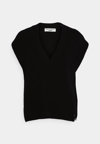 Schwarze Strickweste mit V-Ausschnitt und breiten Schultern. Strukturierter Stoff und seitliche Schlitze. Etikett mit der Aufschrift "Marc O'Polo DENIM."