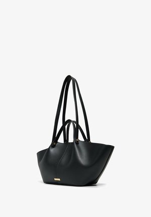 Sac cabas en cuir noir avec deux poignées courtes et deux longues, accents dorés et design structuré à fond large.