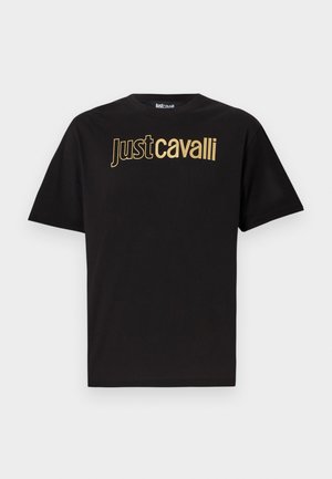 T-shirt in cotone nero con un grande logo dorato "Just Cavalli" sul petto. Collo a giroclassico e maniche corte.