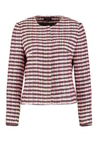 Geweven jack in wit, roze en zwart met een geruit patroon. Heeft een ronde hals en lange mouwen. Geen zichtbare sluitingen.