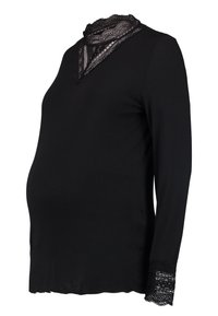 Svart långärmad graviditetstopp med spetsdetalj vid halslinningen och spetsdetaljer på ärmarna, med en lös och flödande passform.