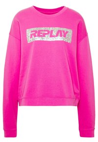 Sudadera rosa con cuello redondo y mangas largas. Presenta un gran gráfico plateado "REPLAY" en la parte frontal. Tejido suave con un ajuste relajado.
