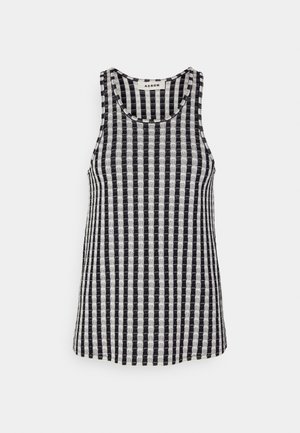 Débardeur rayé noir et blanc, fabriqué en tissu tissé avec un col rond et un design sans manches. Les rayures horizontales créent un motif à carreaux.