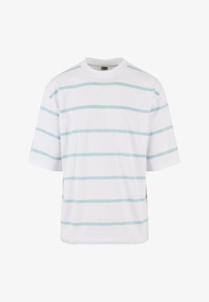 Balta īsajam piedurknēm t-krekls ar gaiši ziliem horizontāliem svītrām. Izgatavots no mīksta kokvilnas auduma ar brīvu piegriezumu un apaļu kakla izgriezumu.