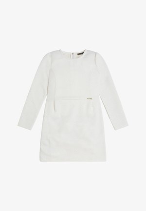 Robe blanche à manches longues avec une texture subtilement à pois, col rond, fermeture éclair au dos et petit détail de poche zippée horizontale à la taille avant.