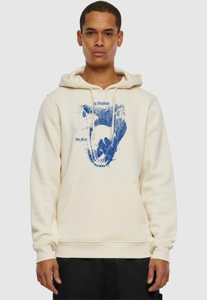 Cream-colored hoodie with a front kangaroo pocket, featuring a blue graphic design and text "No Fear" on a soft, textured fabric.