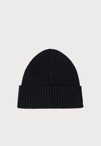 Knitted black beanie with a ribbed texture, featuring a fold-up cuff and a rounded top. Evenly spaced vertical ridges throughout the fabric.