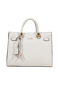 Sac à main en cuir blanc avec poignées tressées, ferrures dorées et porte-clés à pampille attaché. Présente une bordure noire le long des bords.