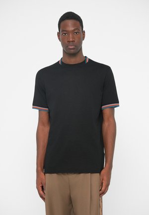 Black T-shirt with short sleeves featuring colorful striped accents at the collar and cuffs, made from smooth fabric. Casual design.
