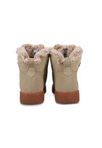 Beige Knöchelstiefel mit strukturiertem, künstlichem Fellfutter und gepolsterter Lasche, Gummisohle mit Profil, mit einer Schlaufe an der Rückseite.