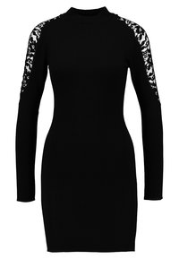 Robe noire à manches longues avec un col montant. Présente des accents de dentelle à motifs sur les épaules et une silhouette ajustée. Fabriquée en tissu extensible.