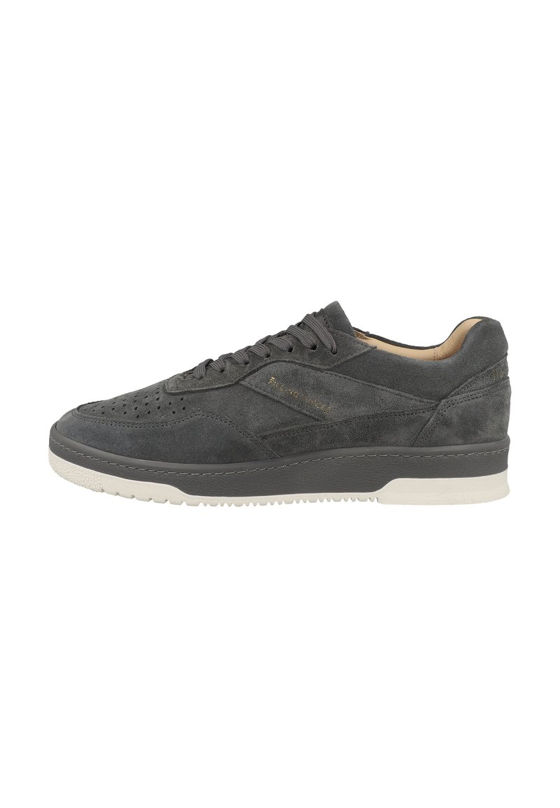 Gray suede sneaker with a perforated toe, matching laces, and a contrasting white rubber sole. Features subtle branding on the side.