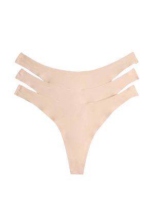 Trois strings beiges sans coutures empilés sur un fond blanc, montrant la vue de face et les détails de la ceinture.